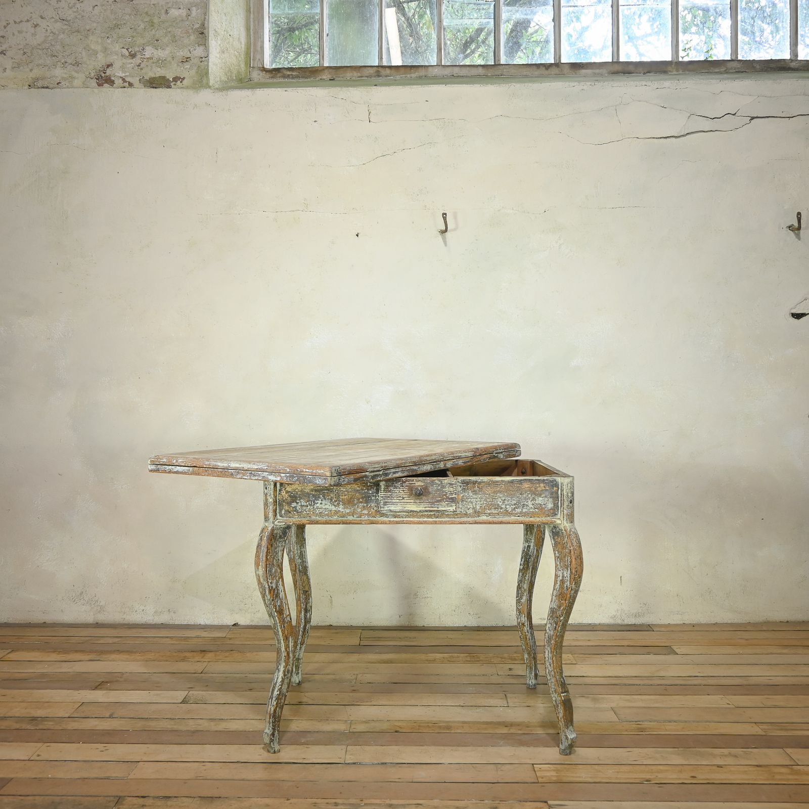 A 19th Century French Painted Swivel Top Dining Table photo furniture