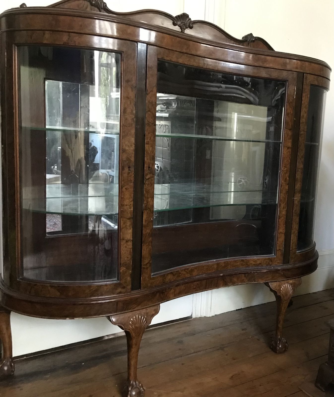 Glass Fronted Display Cabinet With Two Glass Shelves And Mirrored Interior. The Wood Is Walnut. photo for sale