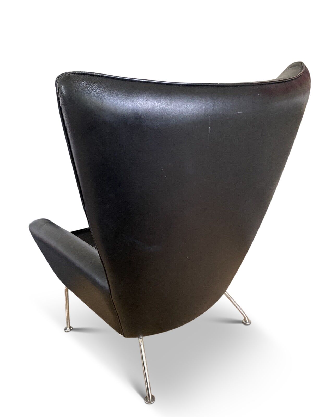 Hans J Wegner Ch445 Design Premium Black Leather And Stainless Steel Wing Armchair Complete With Matching Footstool Ol photo vinterior