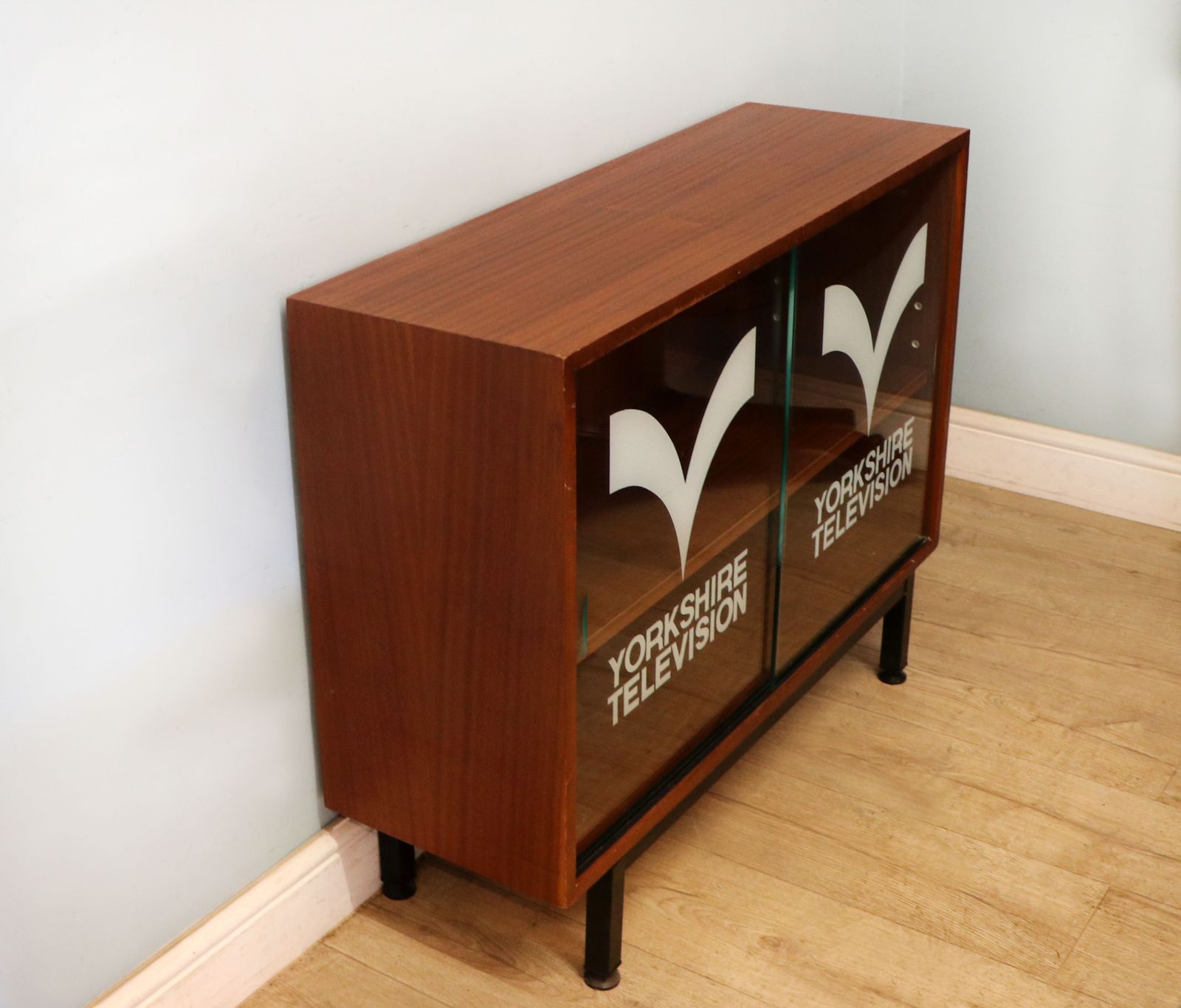This Lovely Retro Teak Finish Display Cabinet Later Sign Written For Yorkshire Television. photo furniture
