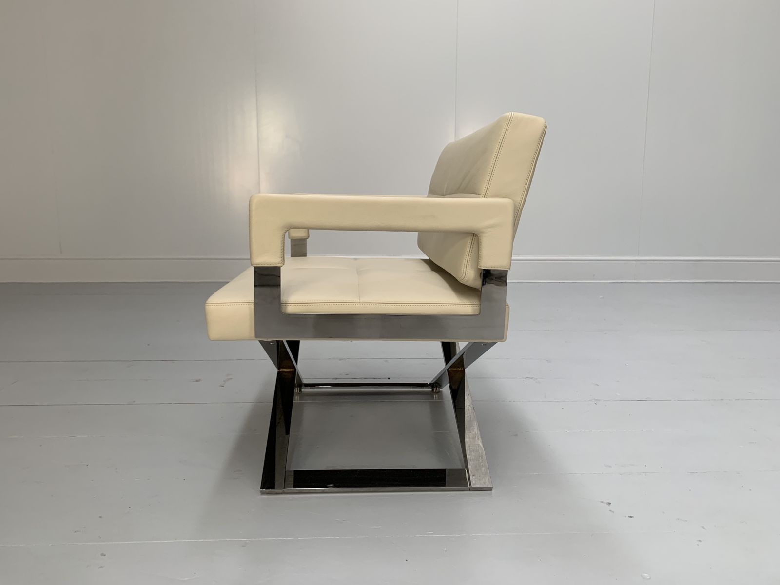 photo furniture Suite Of 8 Poltrona Frau “Aster X” Dining Armchairs – In Ivory “Pelle Frau” Leather