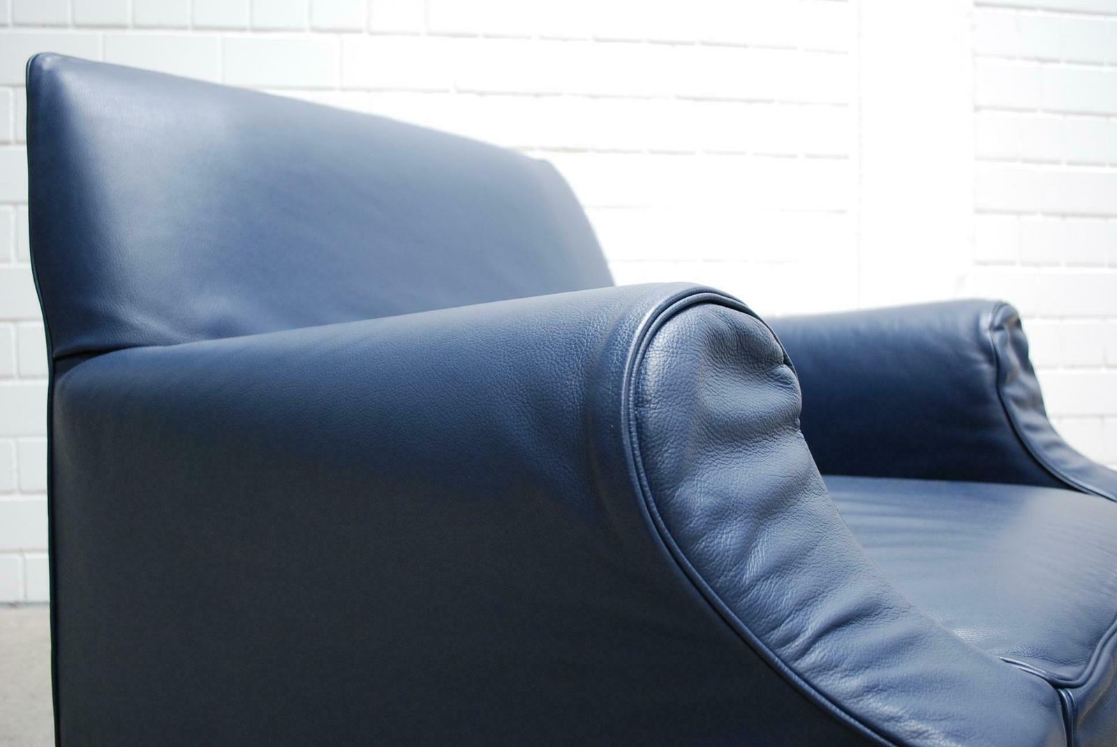 photo furniture Cassina Model Lazy Working Chair Blue Leather Armchair By Philippe Starck