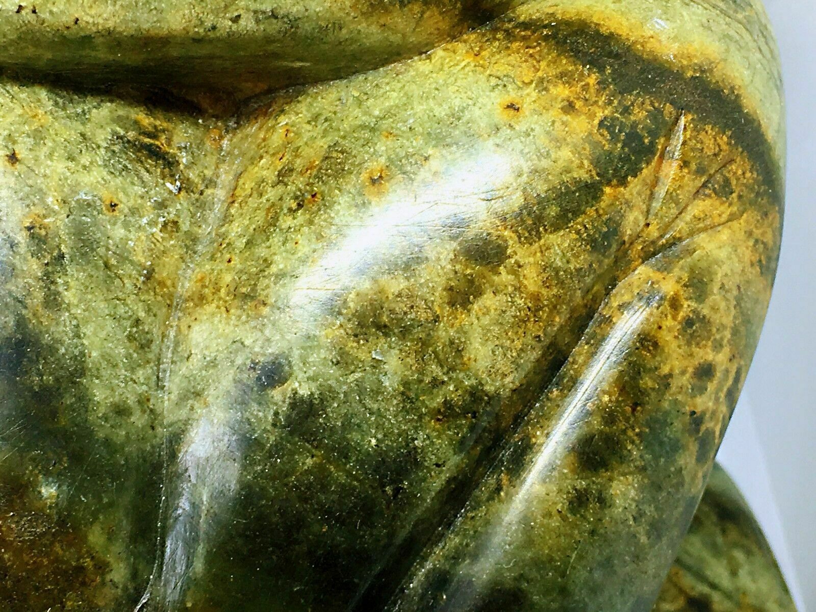 Jade(tough, Green Mineral Either Jadeite Or Nephrite Amphibole)frog With A Book photo 250.0