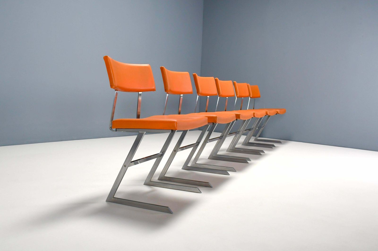 Set Of Six ‘Zig Zag’ Chairs In Metal And Orange Leatherette, Belgium 1960s photo furniture