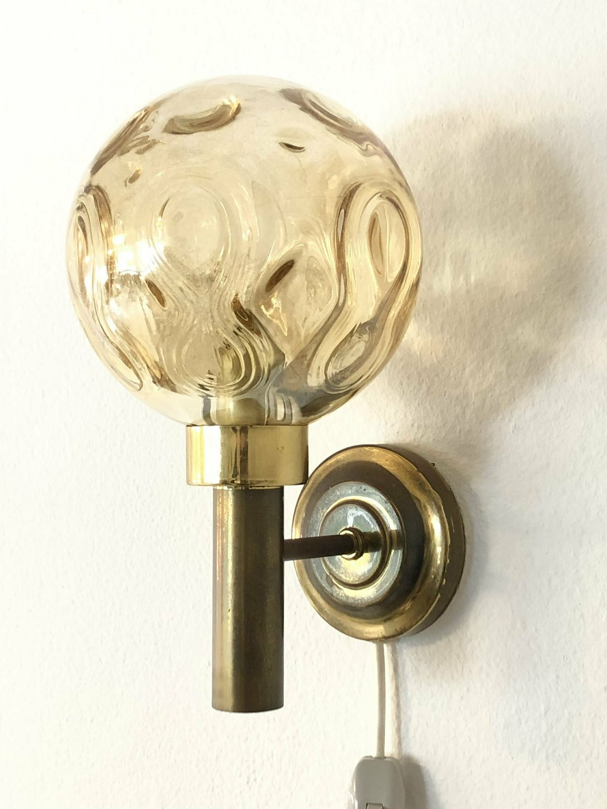 Elegant Danish Mid Century Design Wall Lamps With Globe Amber Glass Shade And Brass Wall Mount photo for sale