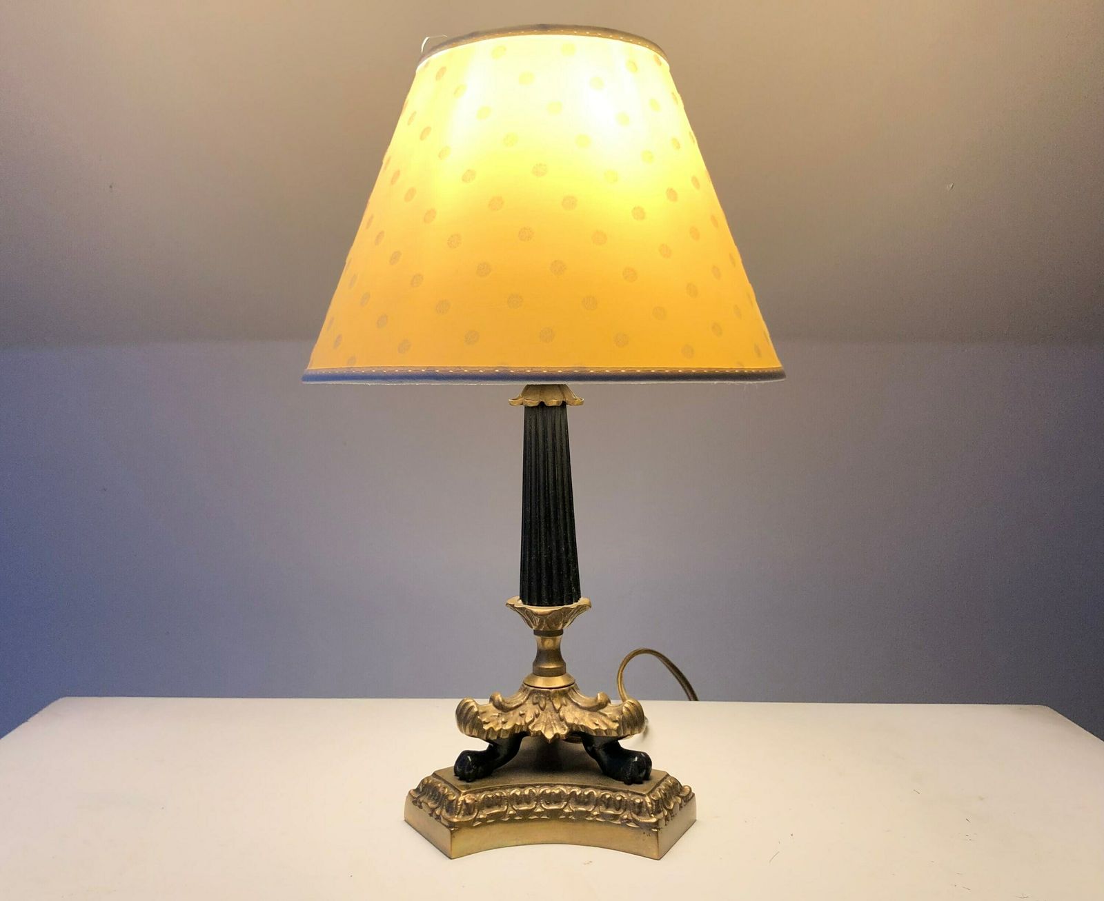Empire Style Tripod Table Lamp In Brass And Black Painted Metal With Organic Shapes, Lion Feet And Off White Fabric Shade With Dots