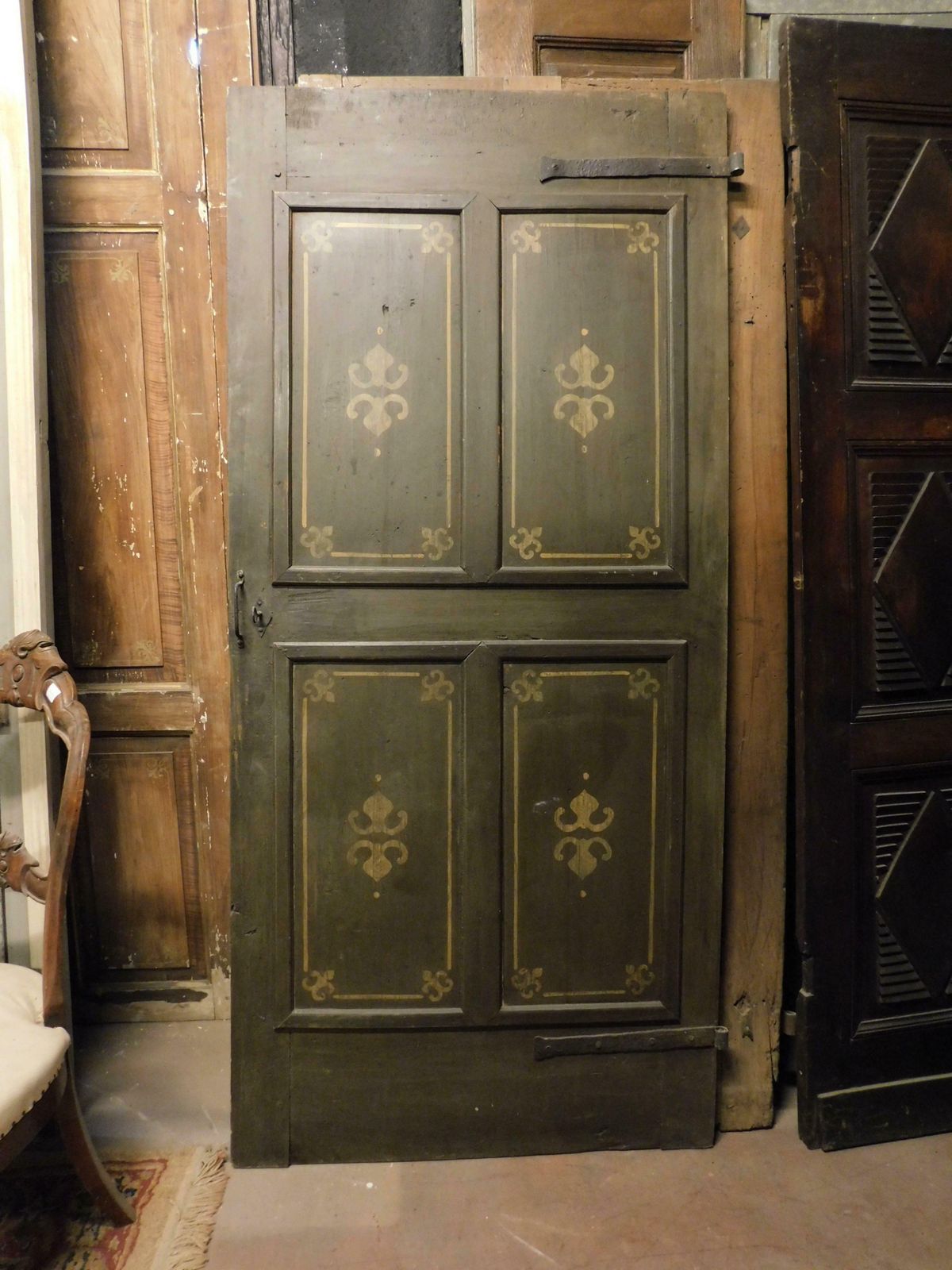 Old Door With 4 Painted Panels, Yellow Decorations On Green Background, Italy photo 2221.0