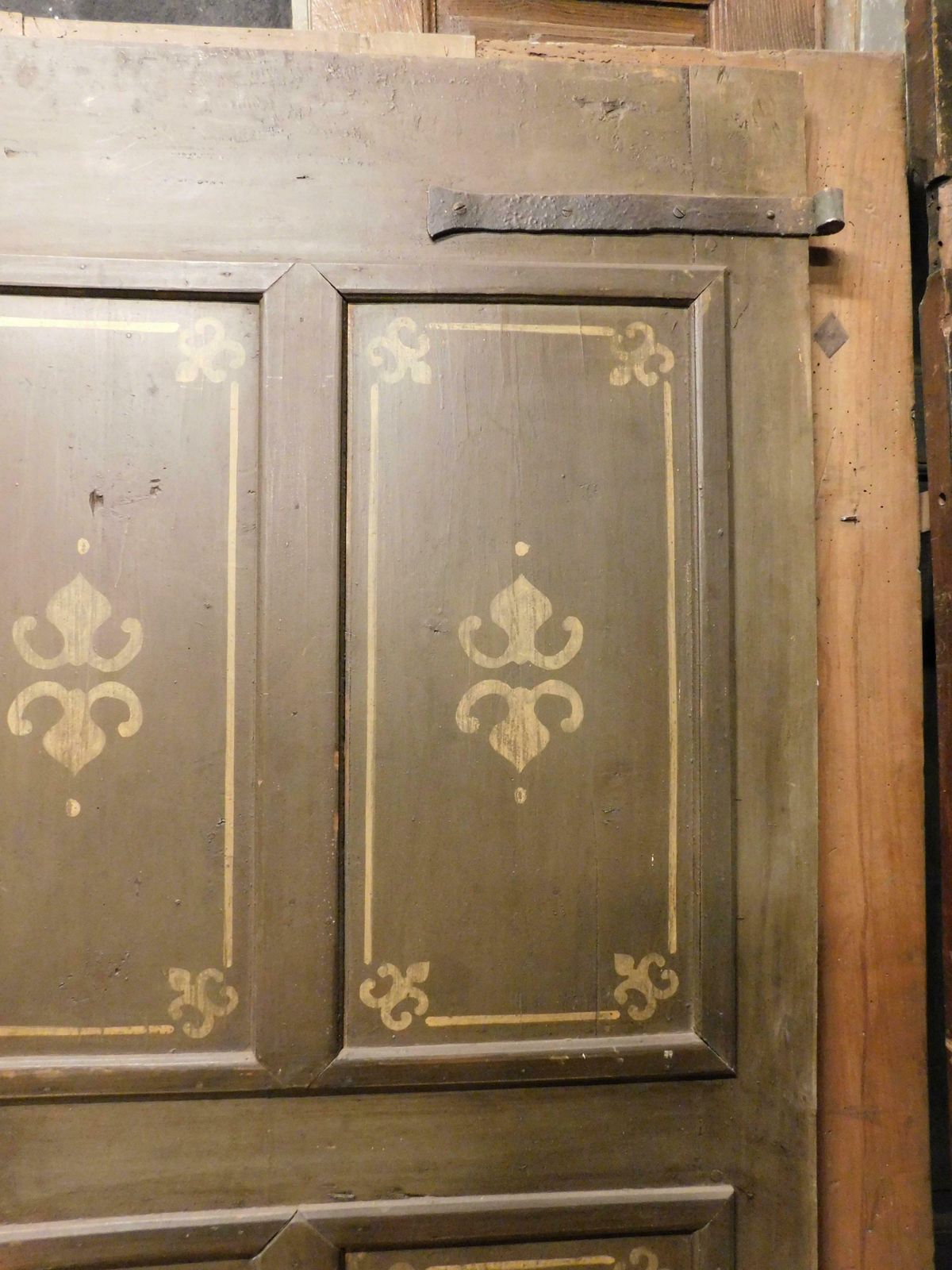 Old Door With 4 Painted Panels, Yellow Decorations On Green Background, Italy photo vintage