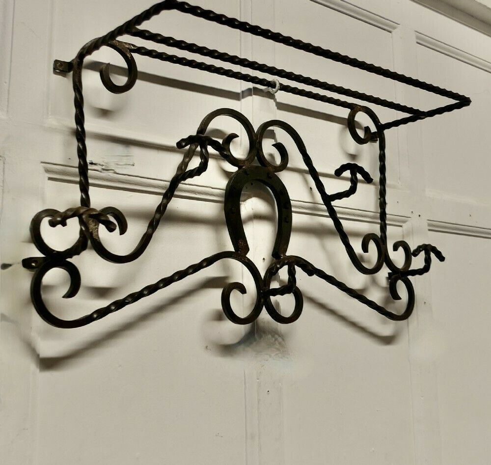 French Wrought Iron Wall Hanging Rack For Coats And Tack On A Horse Riding Theme photo for sale