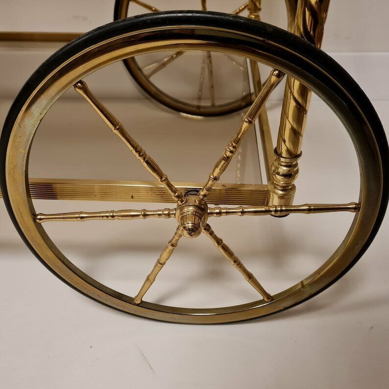 photo for sale Vintage Hollywood Regency Brass Trolley Bar Cart With Smoked Glass.