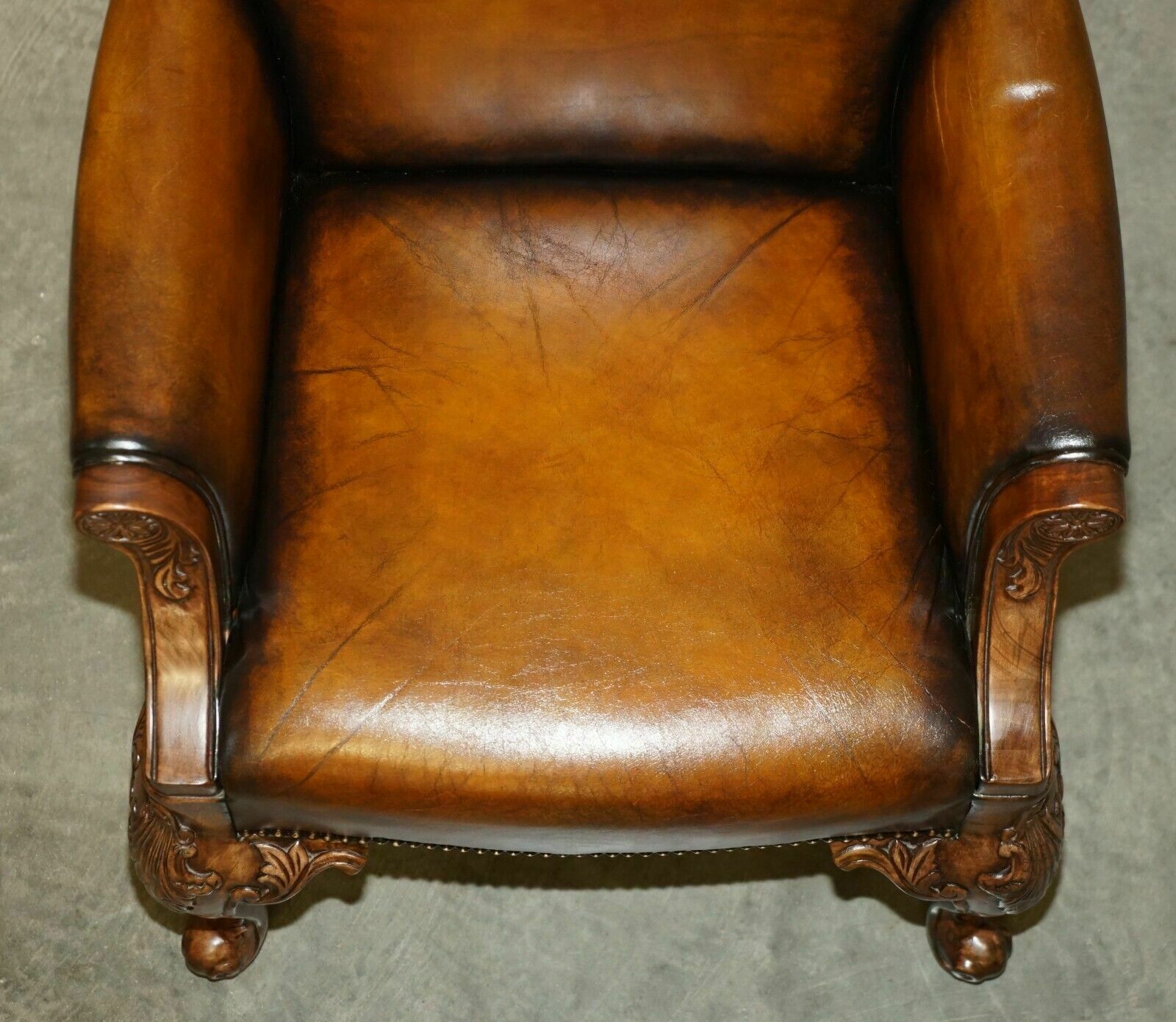 photo buy Pair Of Antique Heavily Carved Hand Dyed Brown Leather Restored Throne Armchairs