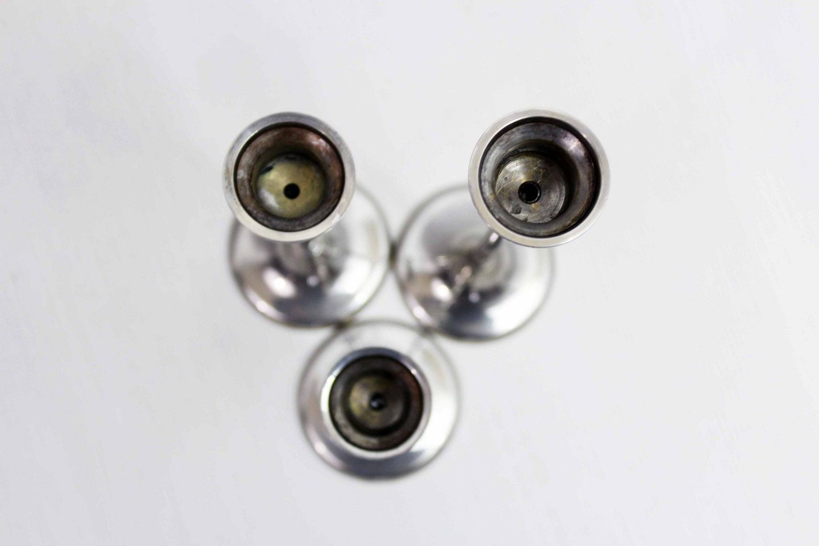 photo furniture Trio Of Silver Metal Candlesticks From The 1950s