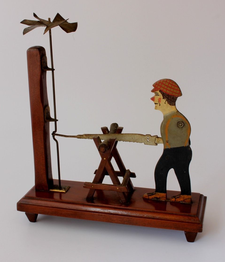 Folk Art Wood Cutter Whirligig. Hand Made Wind Toy Sawing Man. 1932. photo for sale