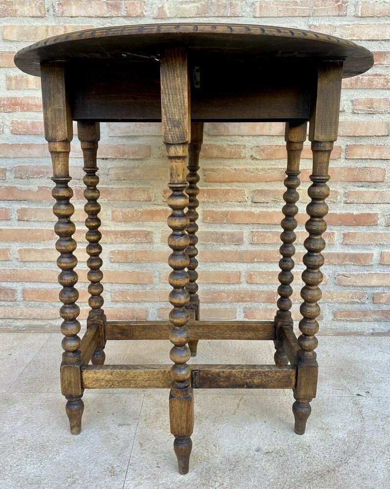 Round Folding Center Oak Table With Carved Top And Solomonic Legs, 1940s photo furniture