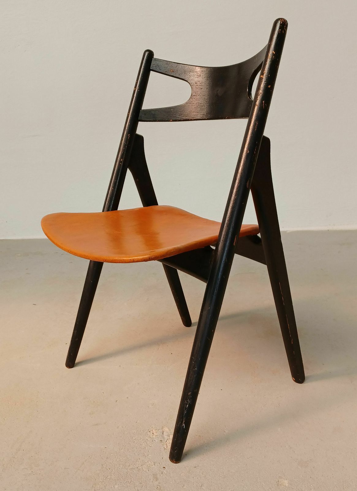 Patinated Hans Wegner Sawbuck Chair With Original Leather 1950s