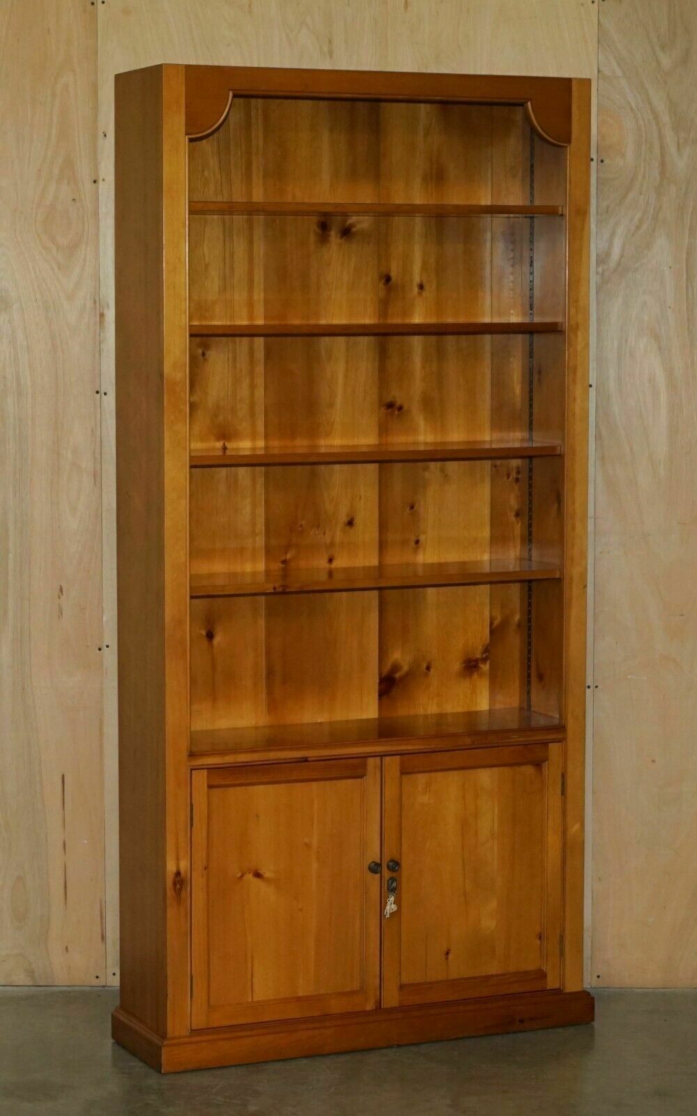 Pair Of Vintage Cherrywood Open Library Bookcases With Lockable Cupboard Bases photo furniture