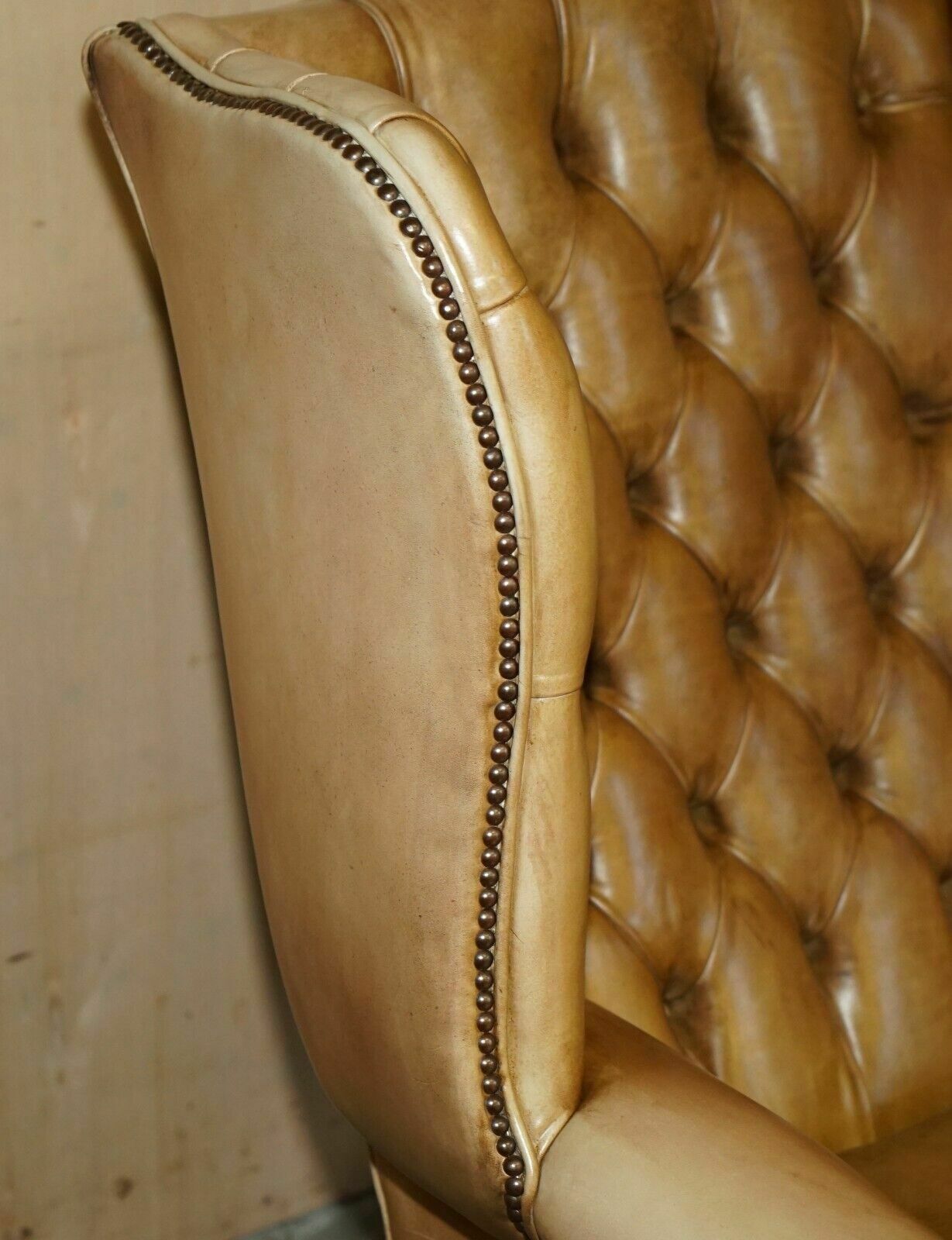 photo for sale Pair Of Vintage Tan Brown Leather Chesterfield Wingback Chairs With Footstools