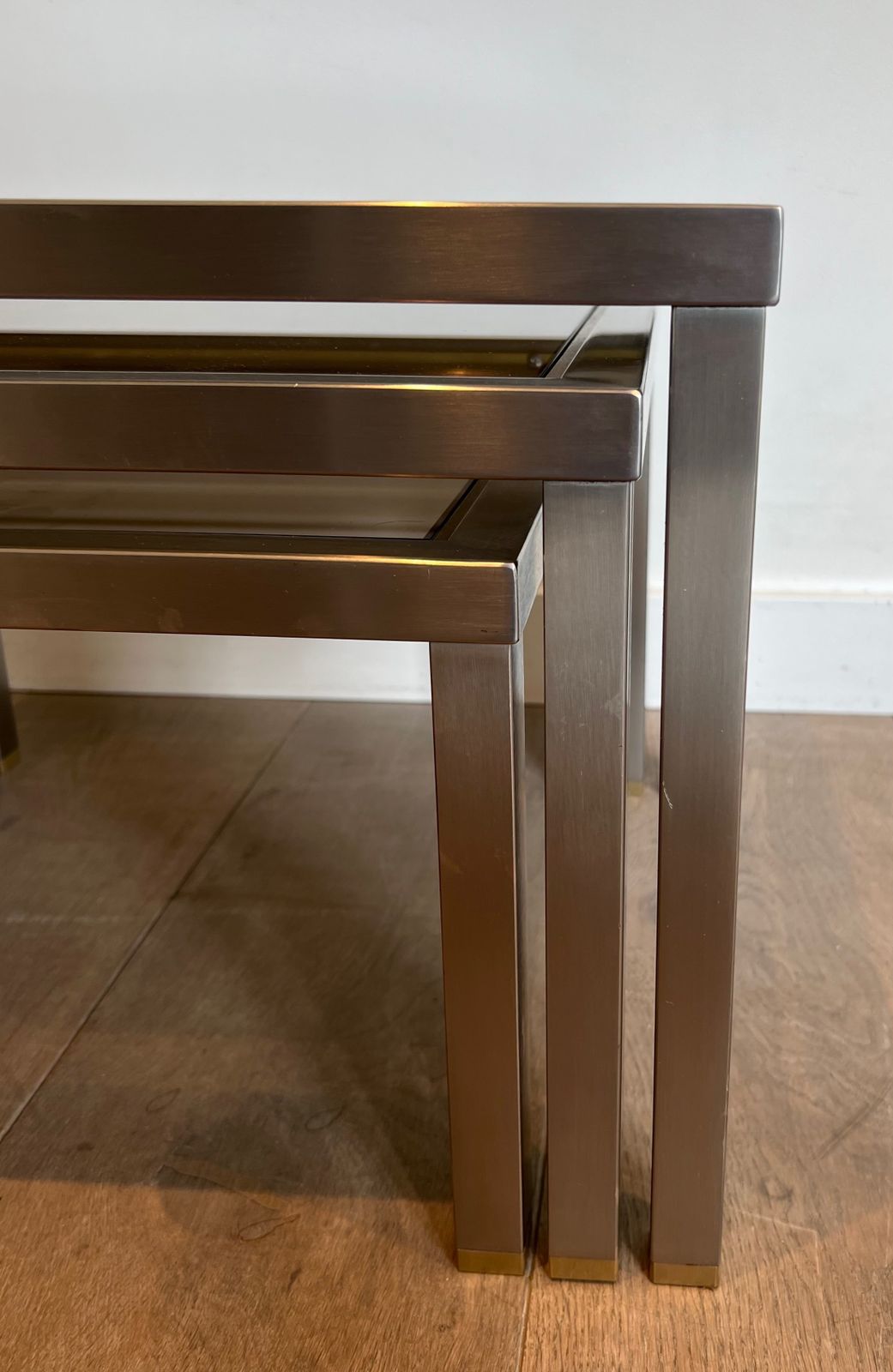 photo for sale Suite Of 3 Nesting Tables In Brushed Steel And Brass Attributed To Guy Lefèvre
