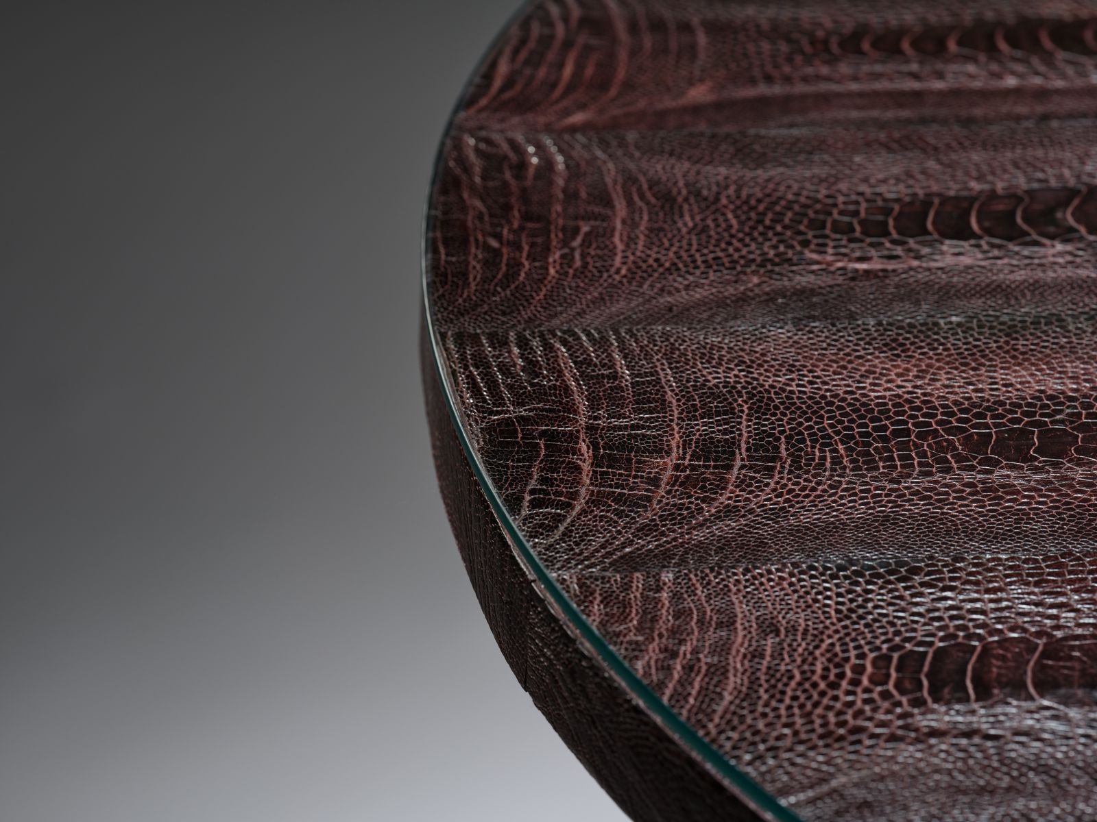 photo for sale Unique And Rare Aubergine Hand Dyed Boa Constrictor Snakeskin Table Resting On Black Hand Laced Leather Legs, South Africa Circa 1980's.