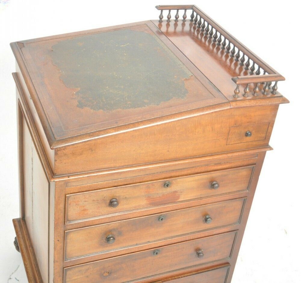 photo furniture A William IV Mahogany Sliding Top Davenport