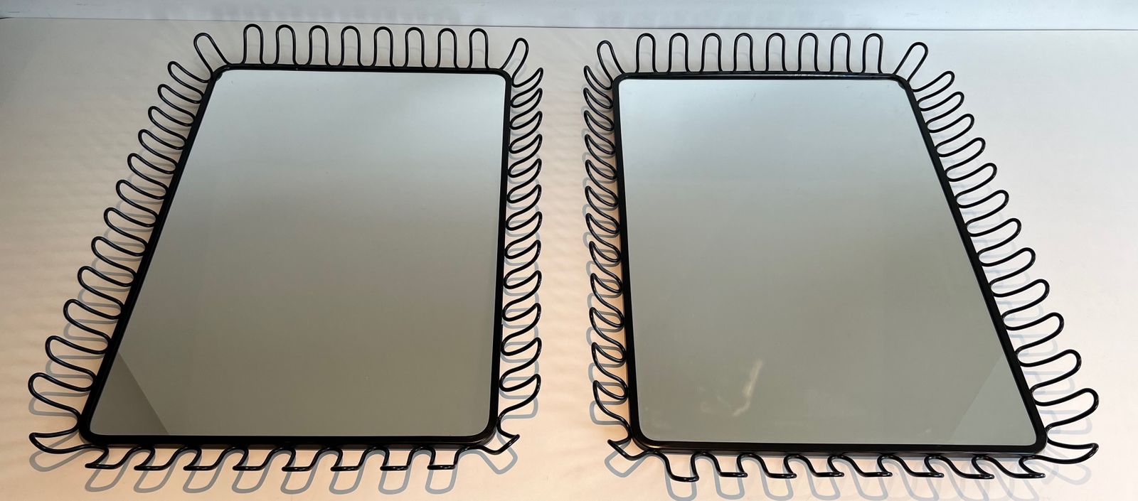 Pair Of Mirrors In Black Lacquered Metal In The Taste Of Jean Royère. Around 1980