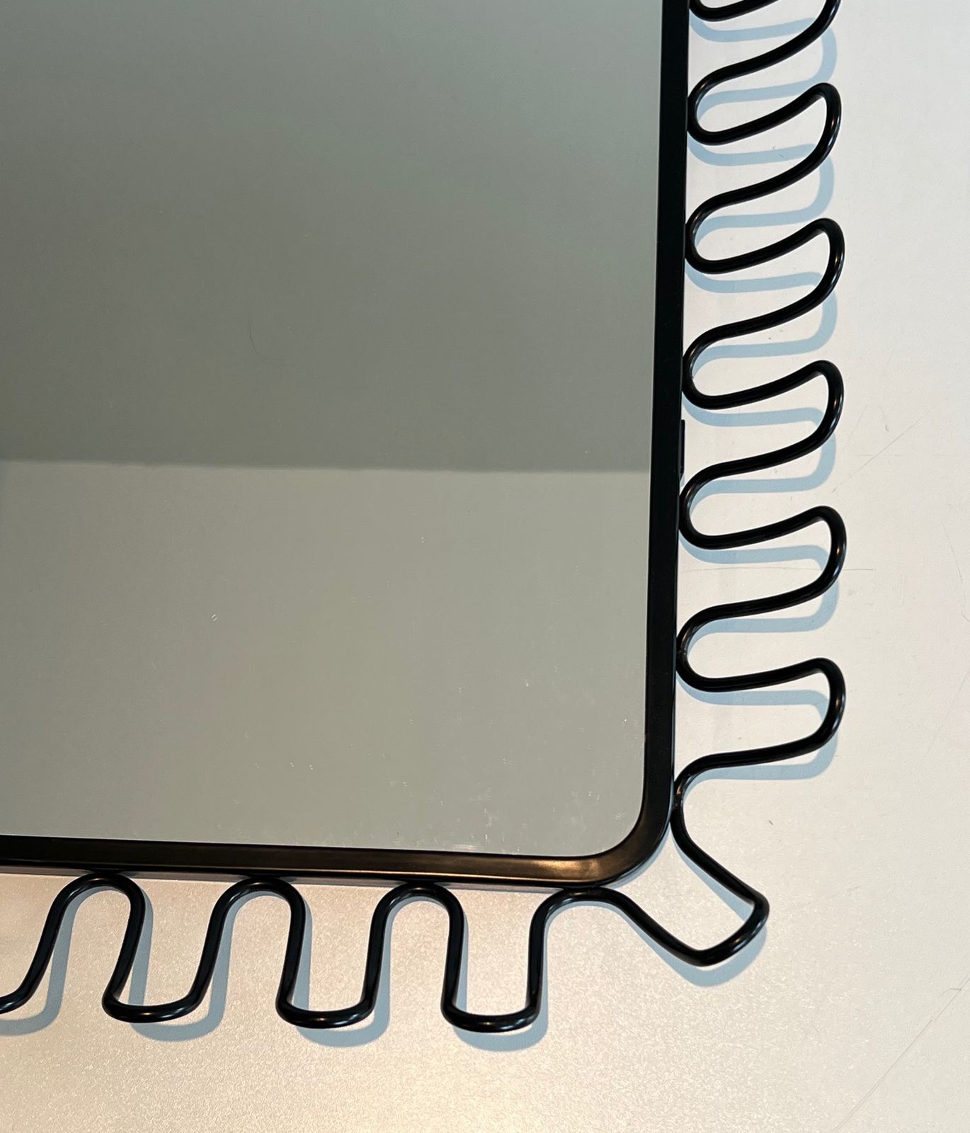 photo for sale Pair Of Mirrors In Black Lacquered Metal In The Taste Of Jean Royère. Around 1980