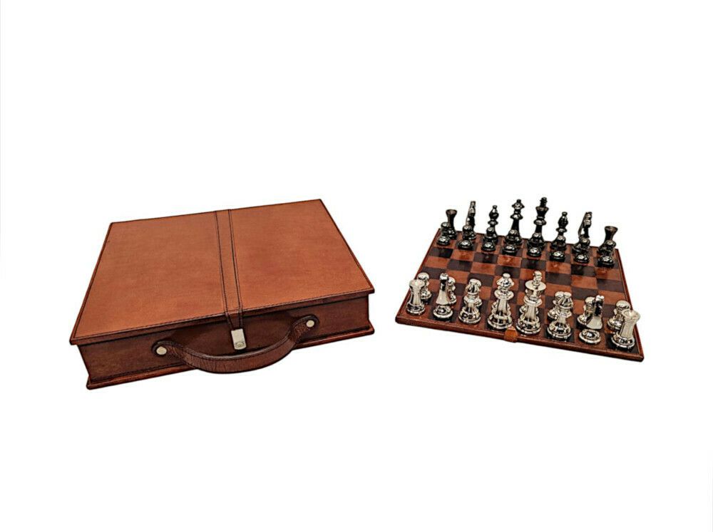 A Fabulous Leather Chess Set And Case
