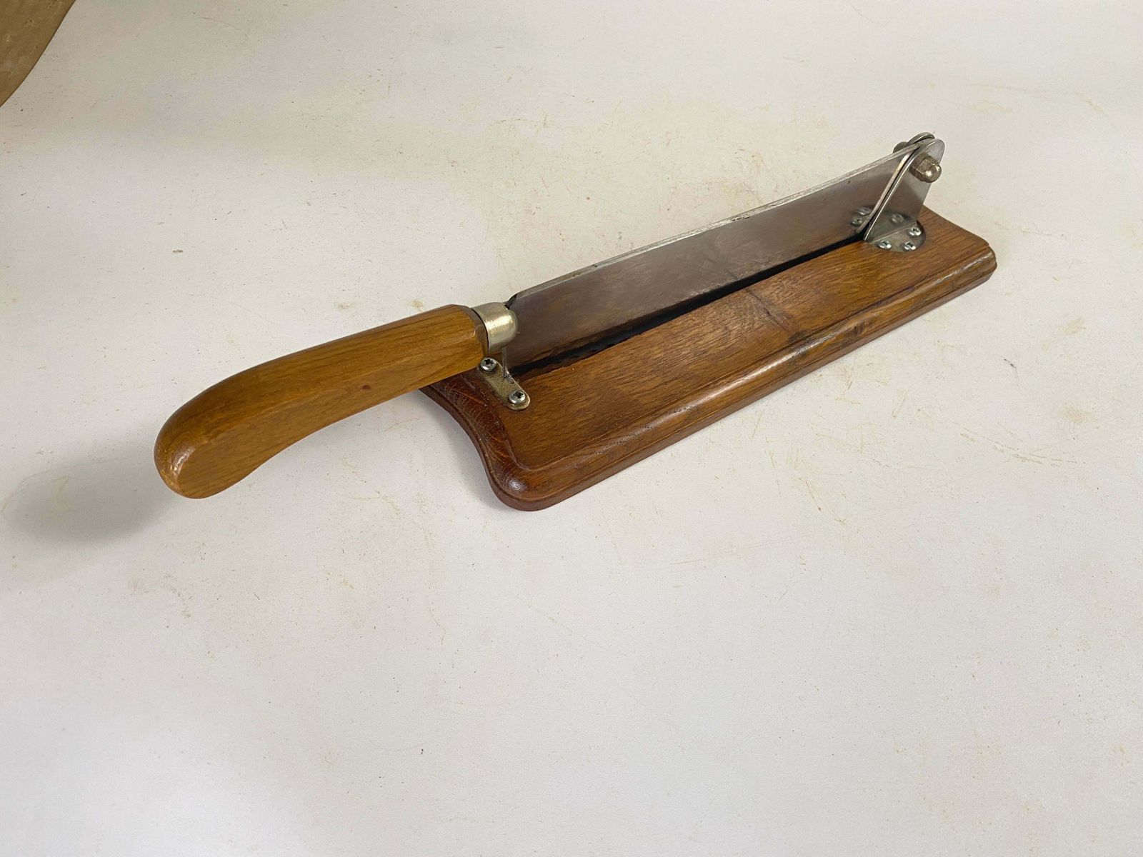 French Wood And Steel Bread Knife On A Wood Plate Brown Color 20th Century photo vinterior