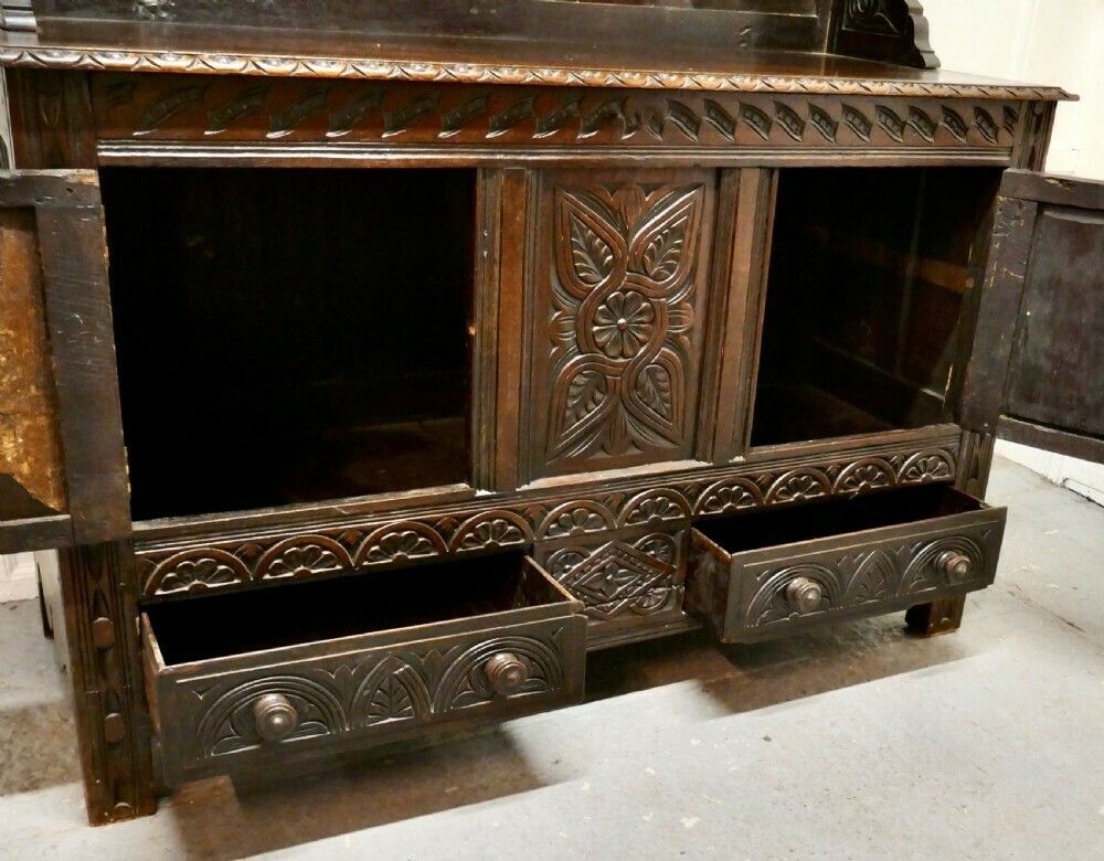 1800.0 18th Century Carved Oak Dresser With Kings photo