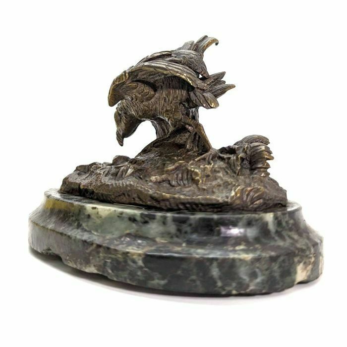 Animal Bronze On Green Marble Base photo vinterior