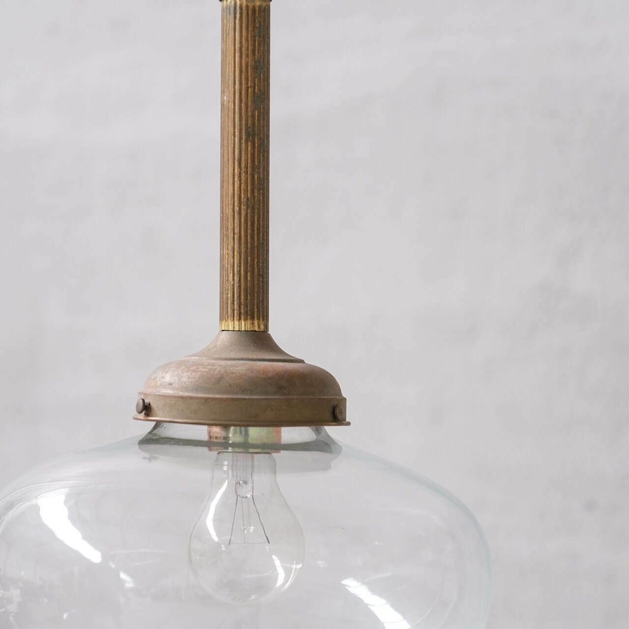 photo furniture Pair Of Clear Glass And Brass Mid Century Teardrop Pendant Lights
