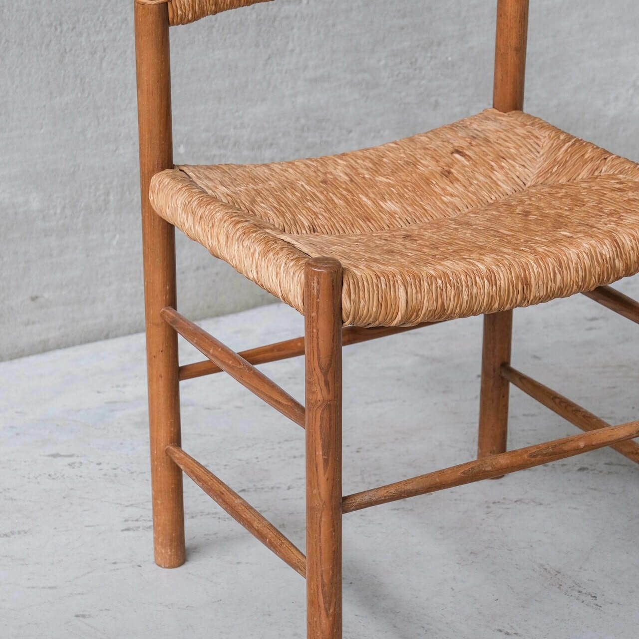 photo furniture Charlotte Perriand 'Dordogne' Mid Century Rush Dining Chairs