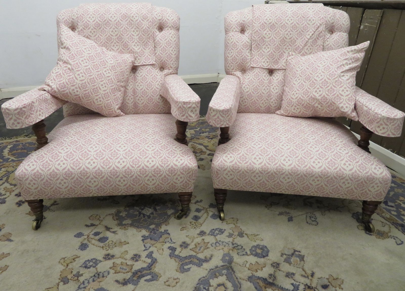 A Pair Of Howard And Sons Walnut Open Armchairs.