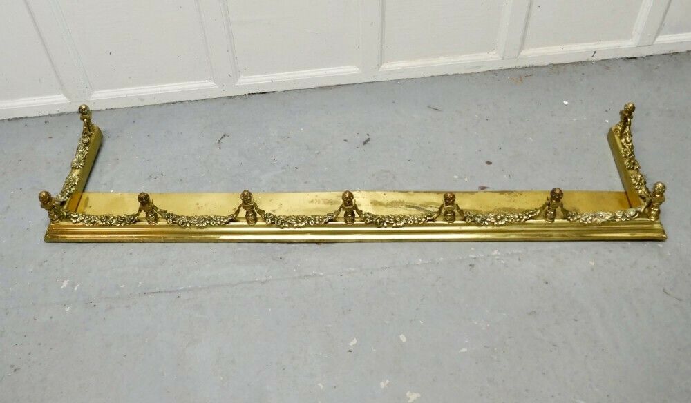 19th Century Heavy Brass Fender With Brass Garlands photo furniture