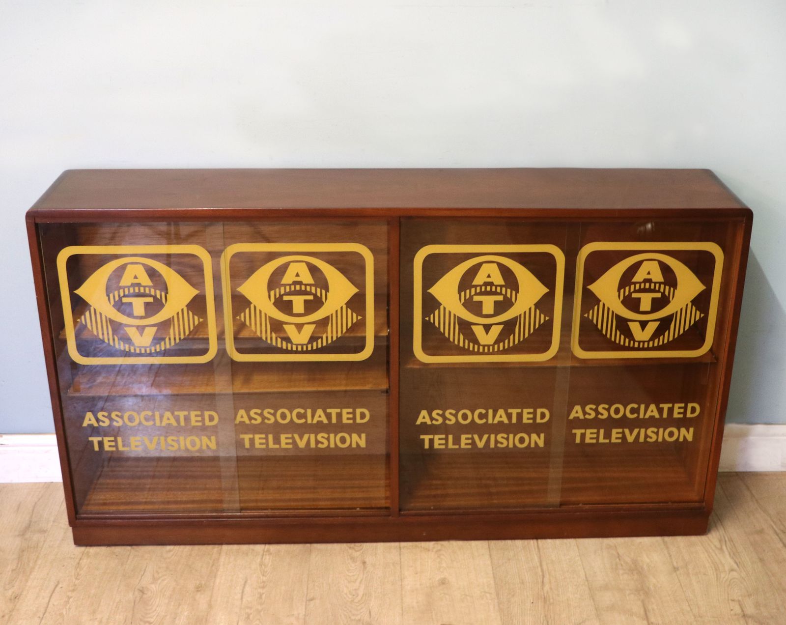 A Wonderful Quality Mid Century Mahogany Veneered Cabinet, Sign Written For Associated Television.