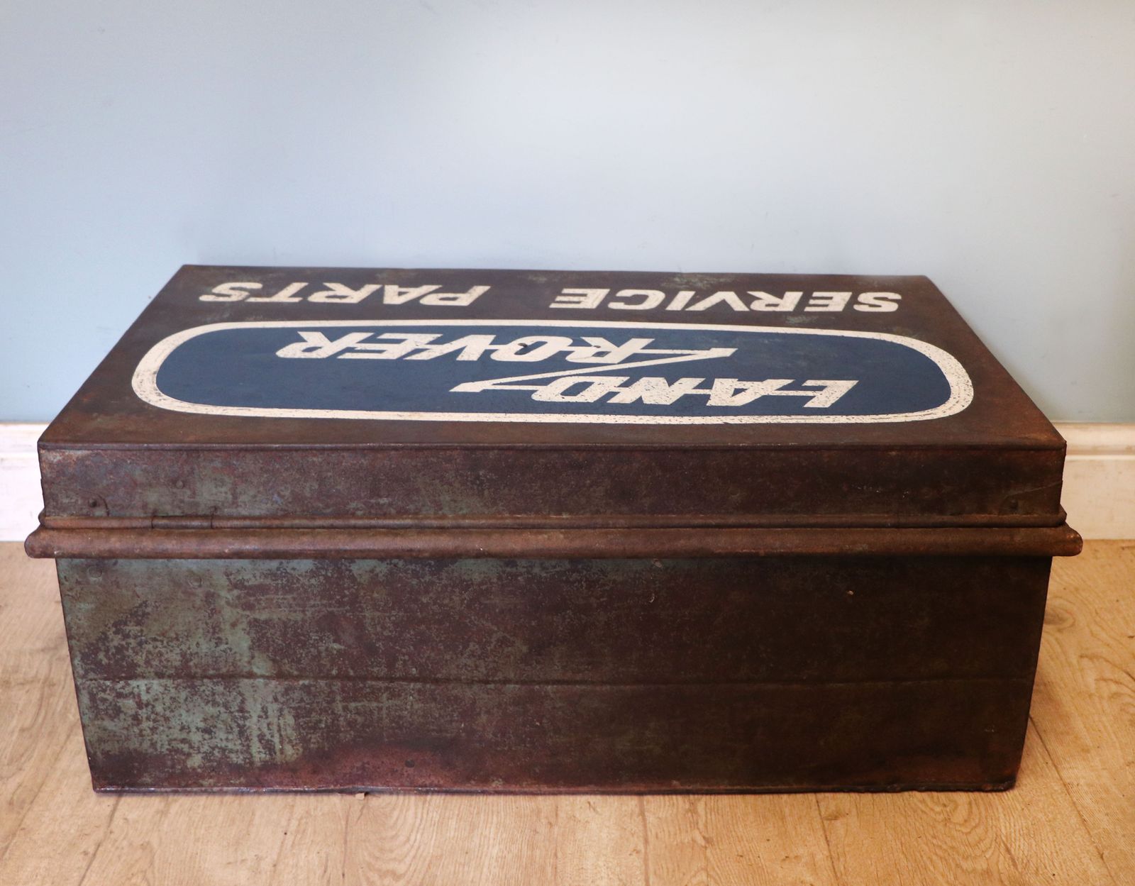 A Lovely Vintage Metal Trunk, Later Sign Written For Land Rover. photo Furniture