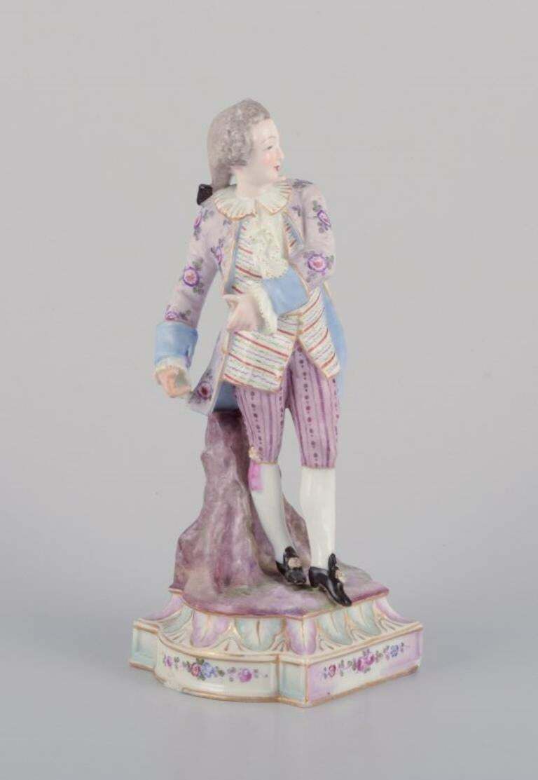 Antique German Porcelain Figurine Of Young Man In Fine Clothes. photo furniture