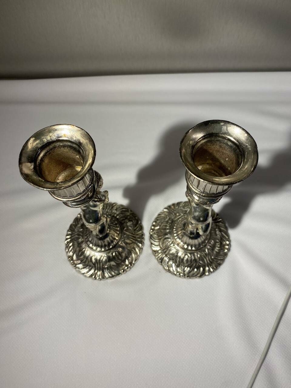 Two Silver Metal Candlesticks Decorated With 20th Century Cherubs photo vinterior
