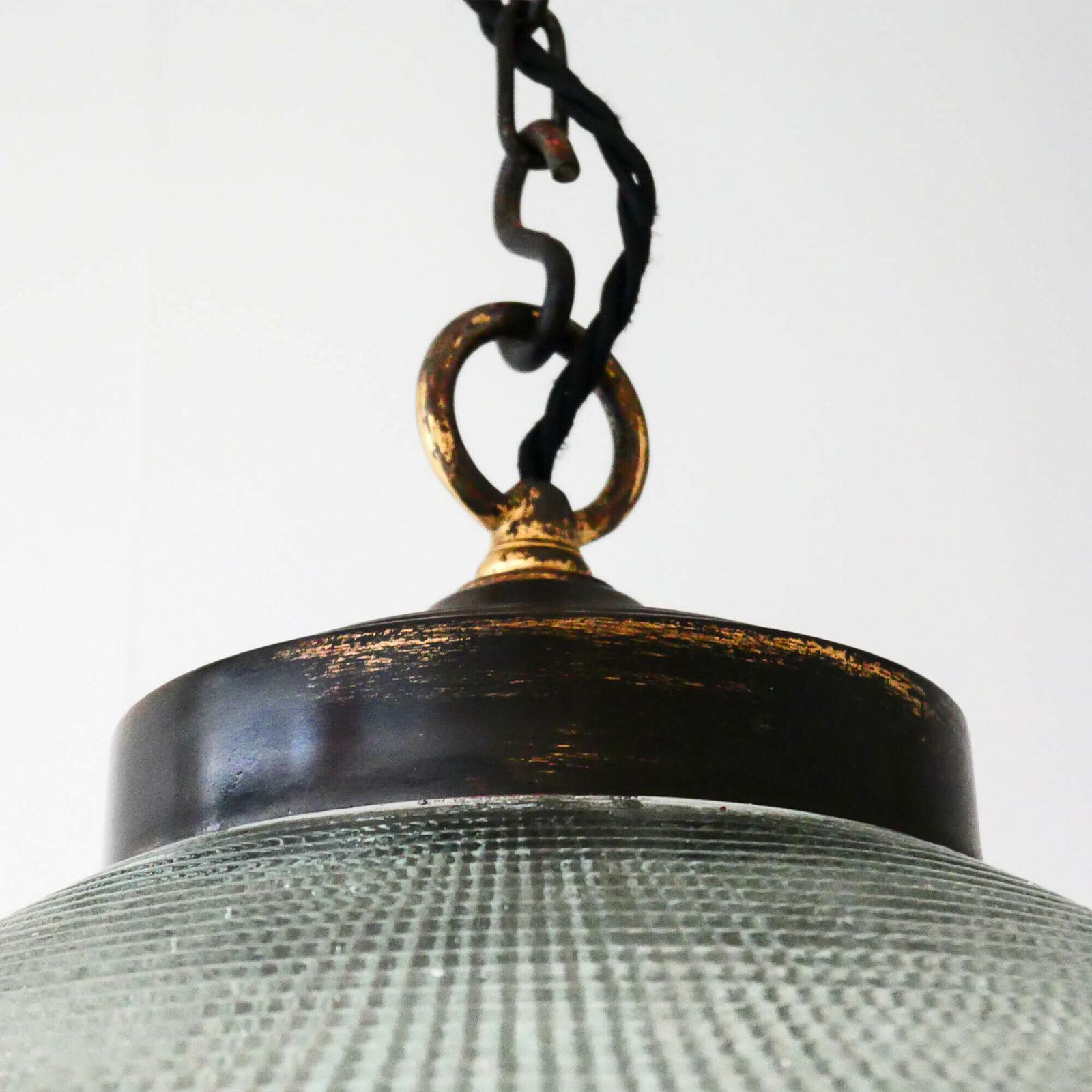 photo furniture “Ellipse” Pendant Light In Glass And Patinated Brass.