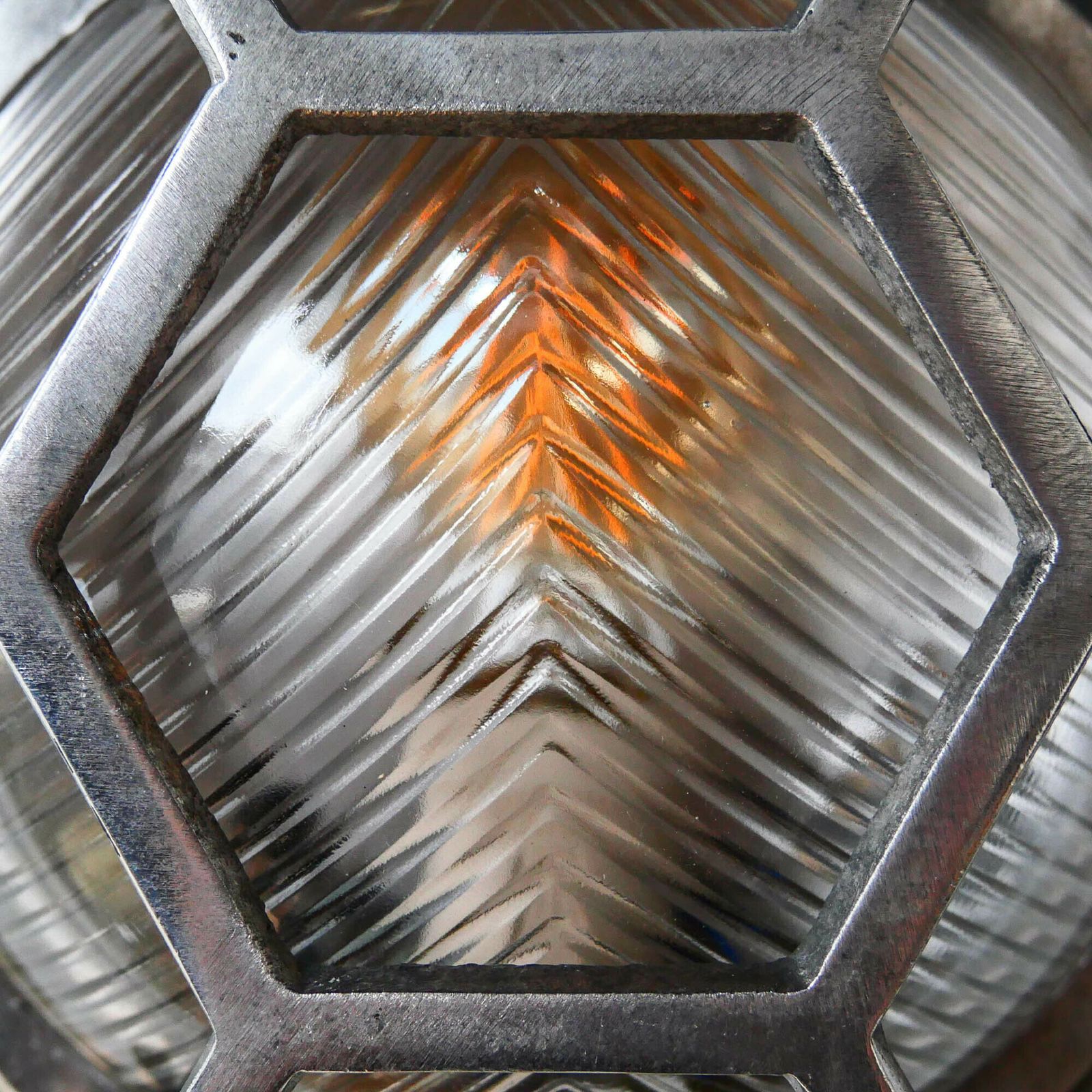 Old Cast Aluminum Wall Light With Hexagonal Grid And Wide Streaked Glass. photo 248.0