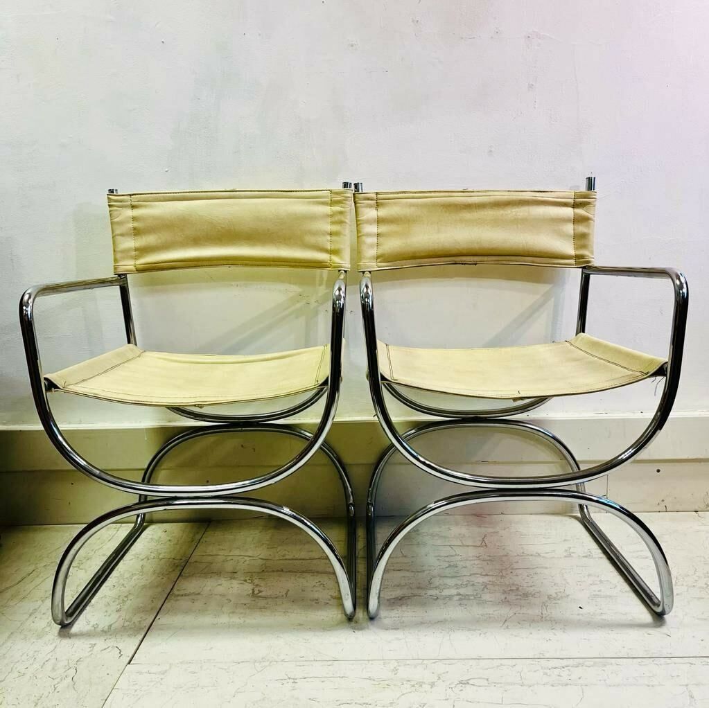 A Pair Of Mid Century Cream Leather And Chrome Chairs Dining Chairs photo 1125.0