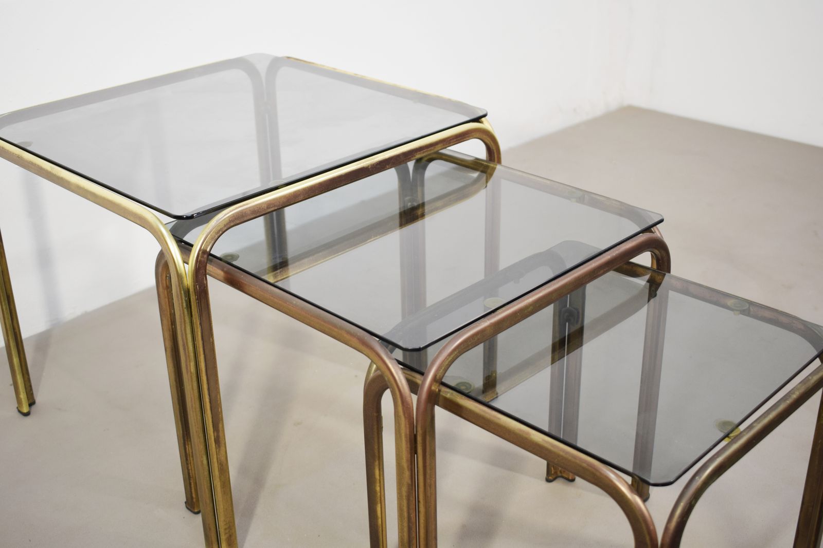 Set Of 3 Stackable Coffee Tables, Brass And Smoked Glass, 1970s. photo for sale