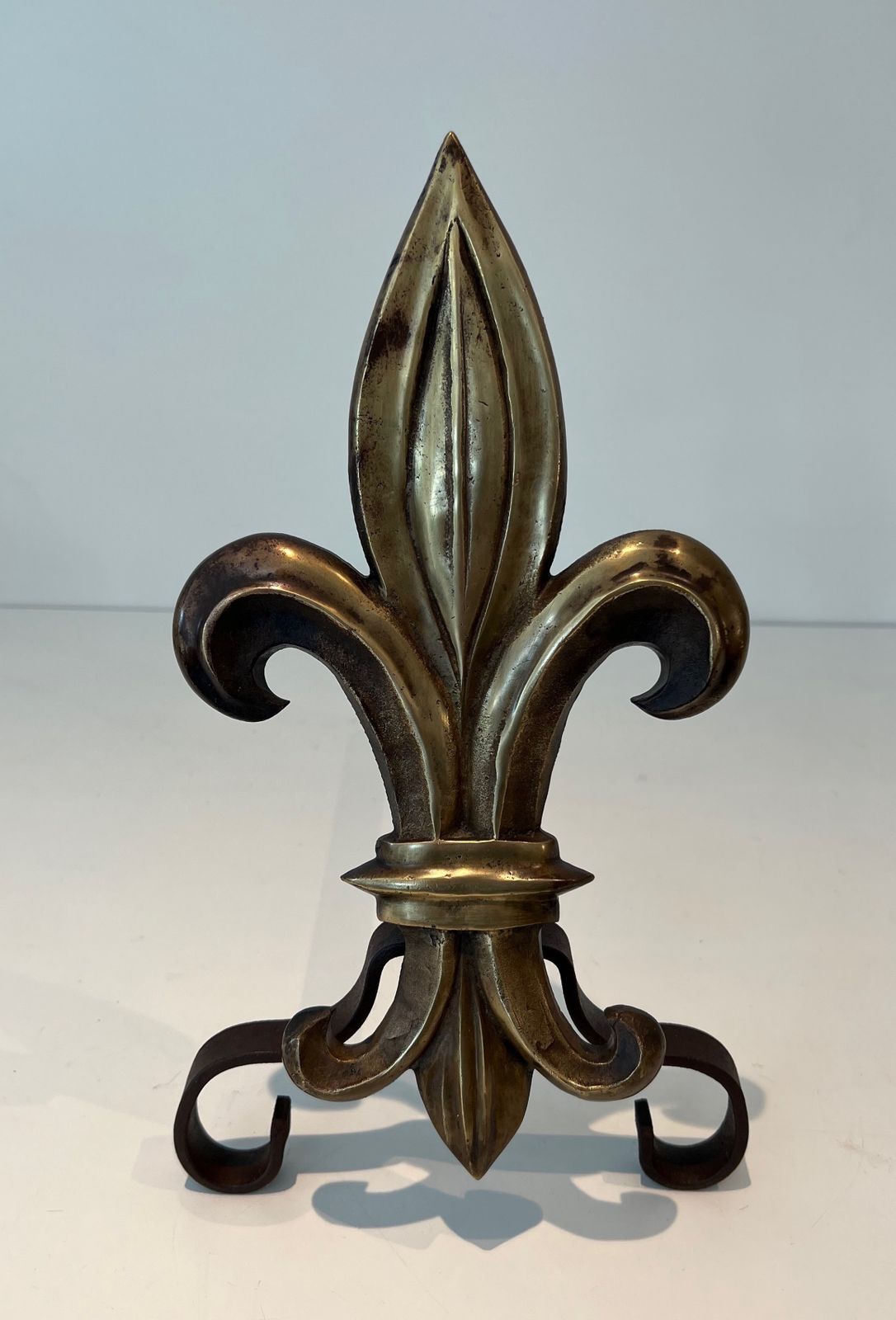 Pair Of Bronze And Wrought Iron Andirons Representing A Fleurs De Lys photo buy