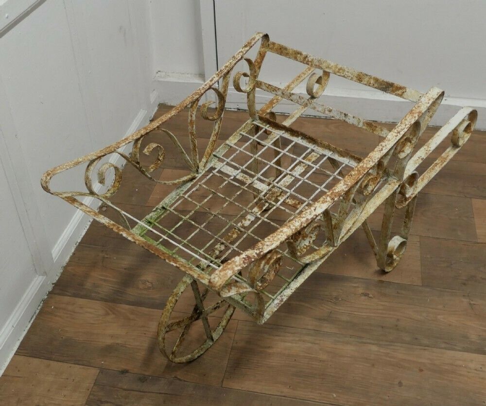 Wrought Iron Hand Cart Wheel Barrow For Plant Display photo for sale