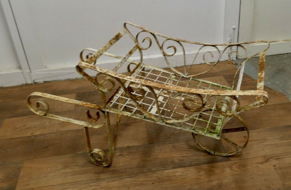 Wrought Iron Hand Cart Wheel Barrow For Plant Display photo Furniture