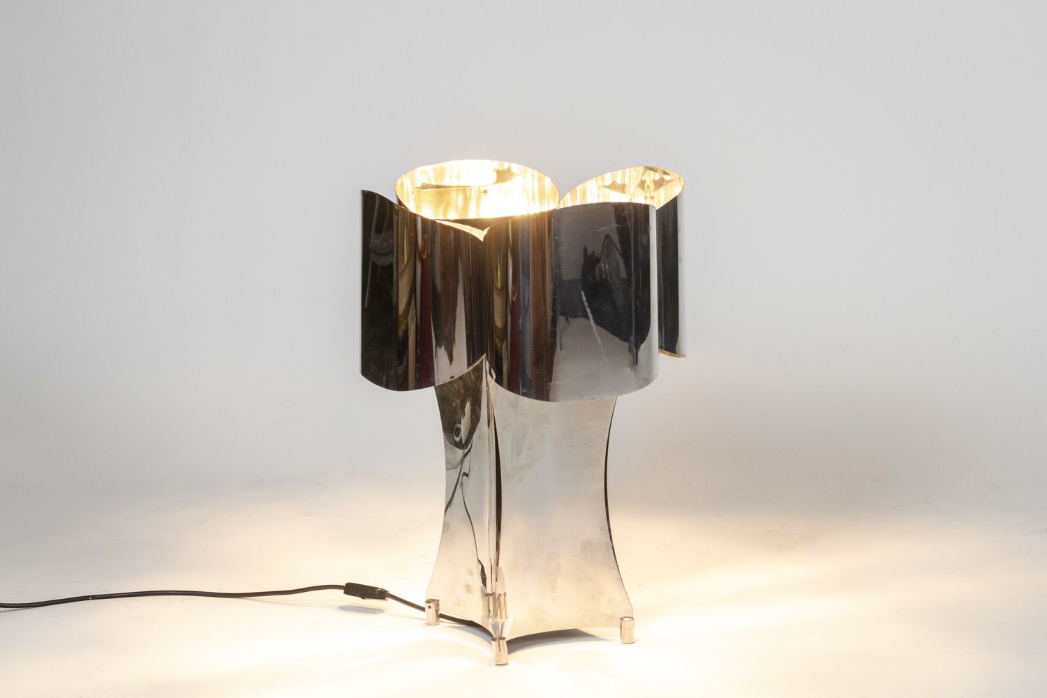 “Quadrilobe” Lamp In Polished Metal. 1970s. photo furniture