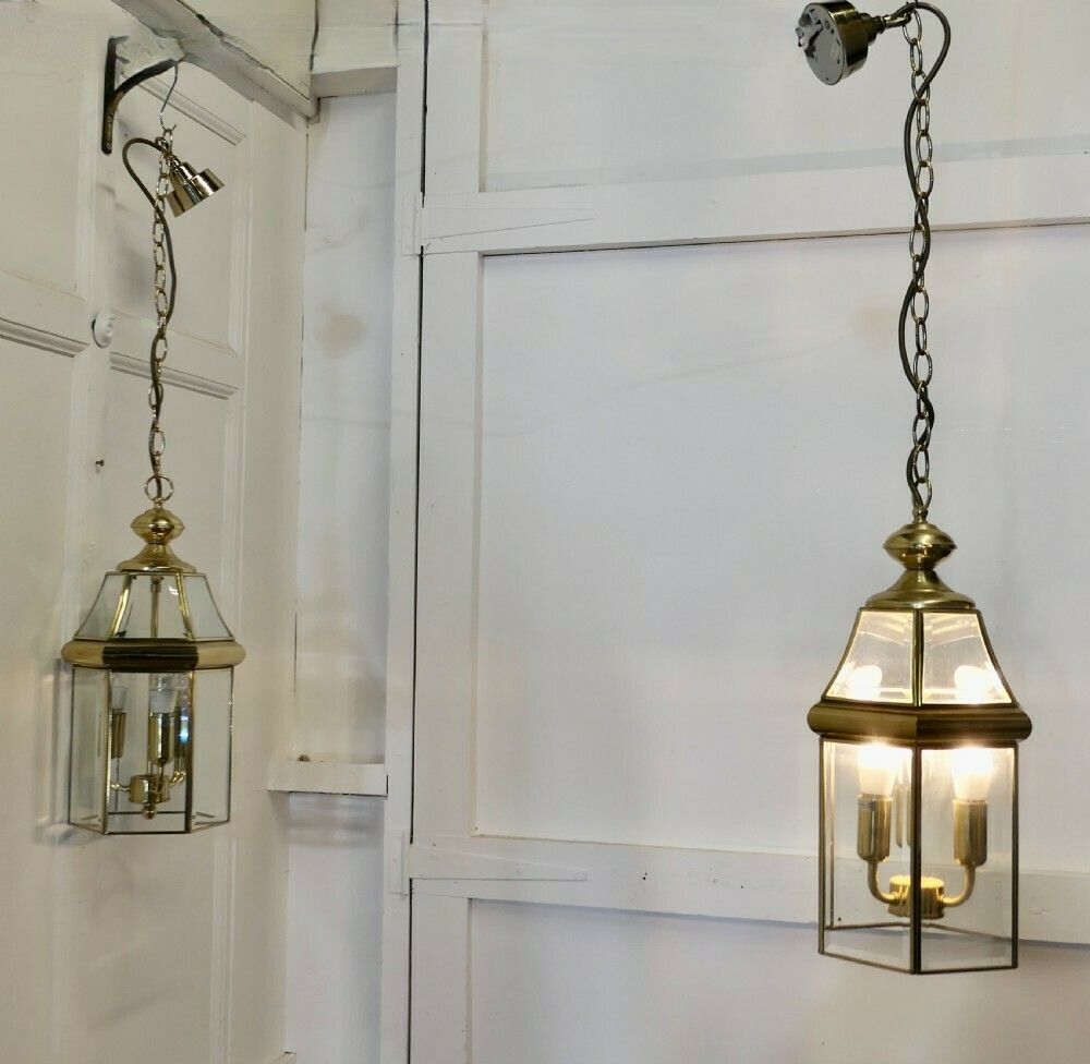 A Pair Of Art Deco Style Brass & Glass Hall Lanterns