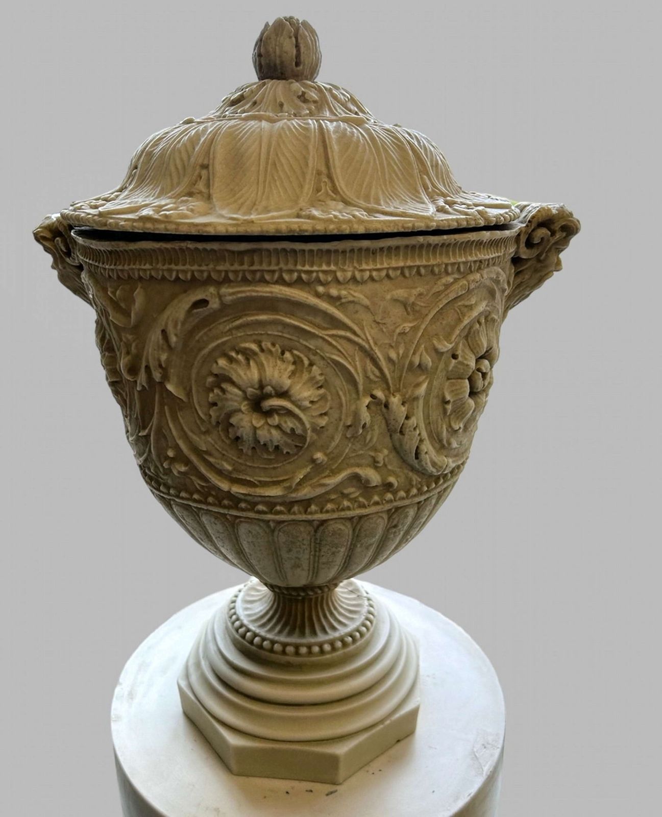 A Pair Of Decorative Pedestals With Lidded Urns photo for sale