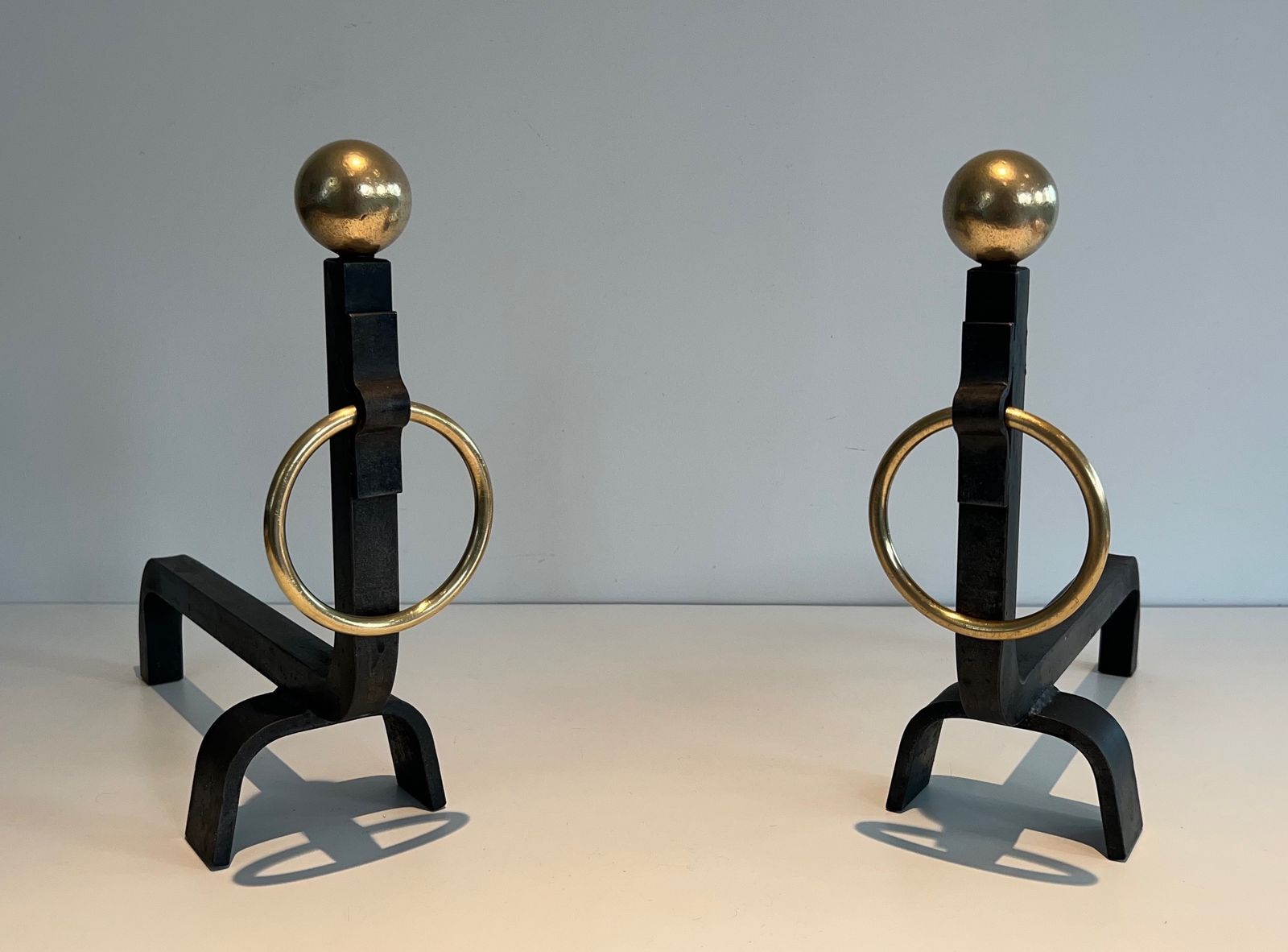 Pair Of Wrought Iron And Brass Andirons In The Taste Of Jacques Adnet photo for sale