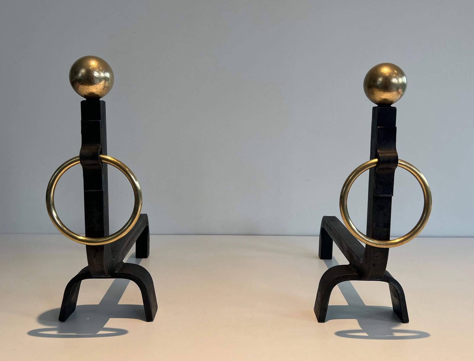 photo vintage Pair Of Wrought Iron And Brass Andirons In The Taste Of Jacques Adnet